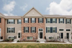 tan and brick apartment complex