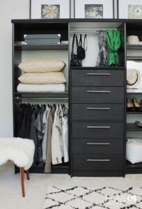 organized black wooden dresser