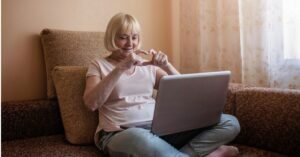 woman sitting at laptop