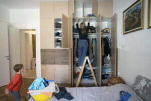 woman organizing closet