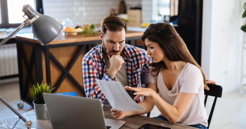 couple looking at papers