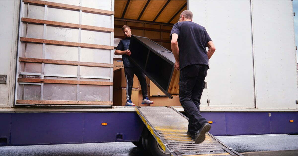 movers carrying furniture