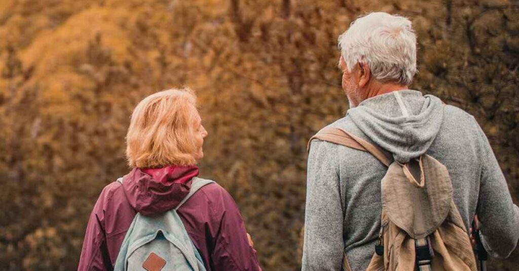 elderly couple walking