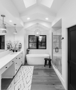 black and white photo of bathroom