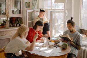 four people in dining room