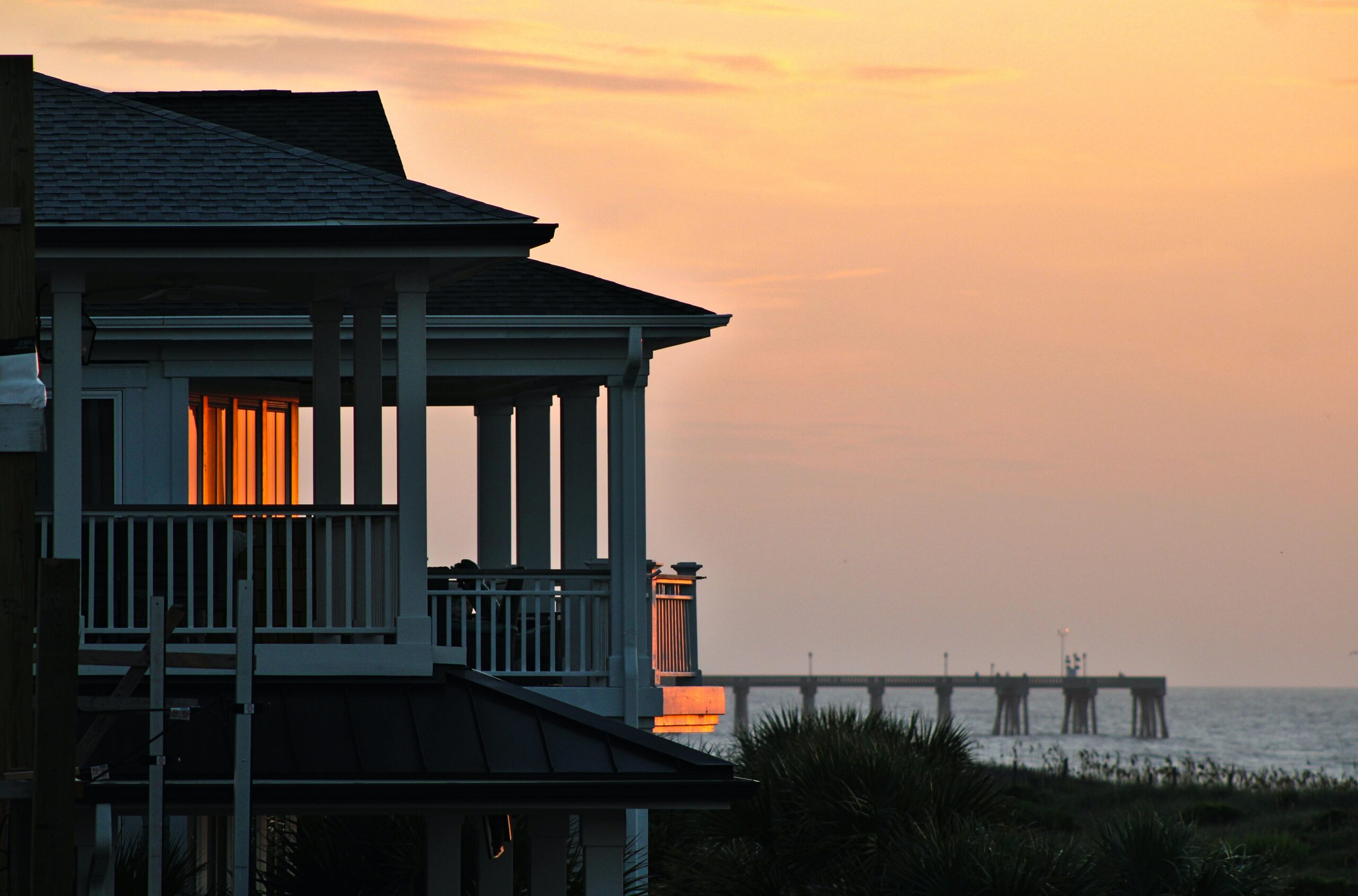 sunset over beach house