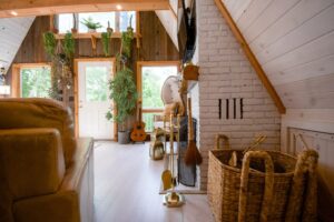 brown and White House with plants