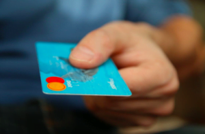 hand holding debit card