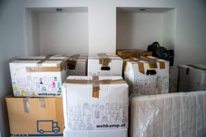 moving boxes stacked in a room