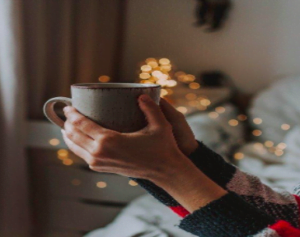 hands holding a coffee mug