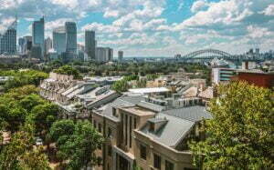 aerial view of a city with skyscrapers and a bridge